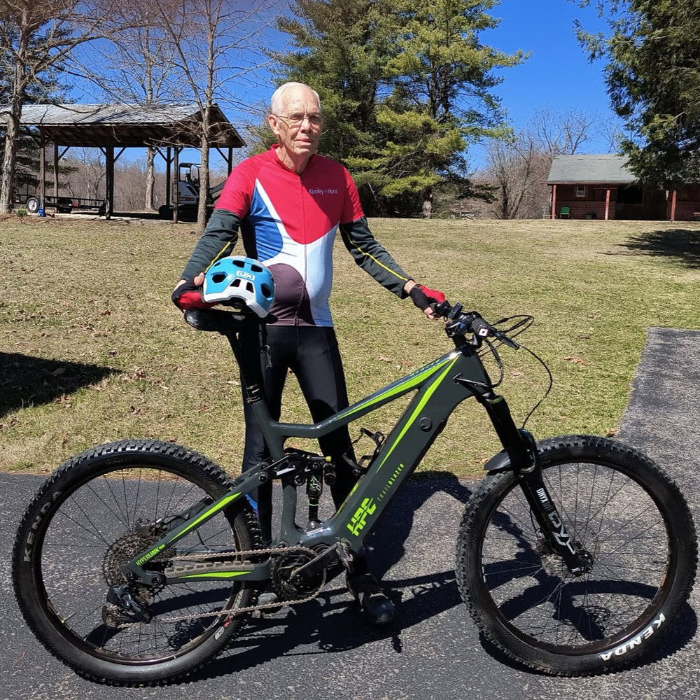 green traiblazer enduro e-bike with older rider